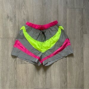 Reflective neon pink, yellow, and grey shorts Size S